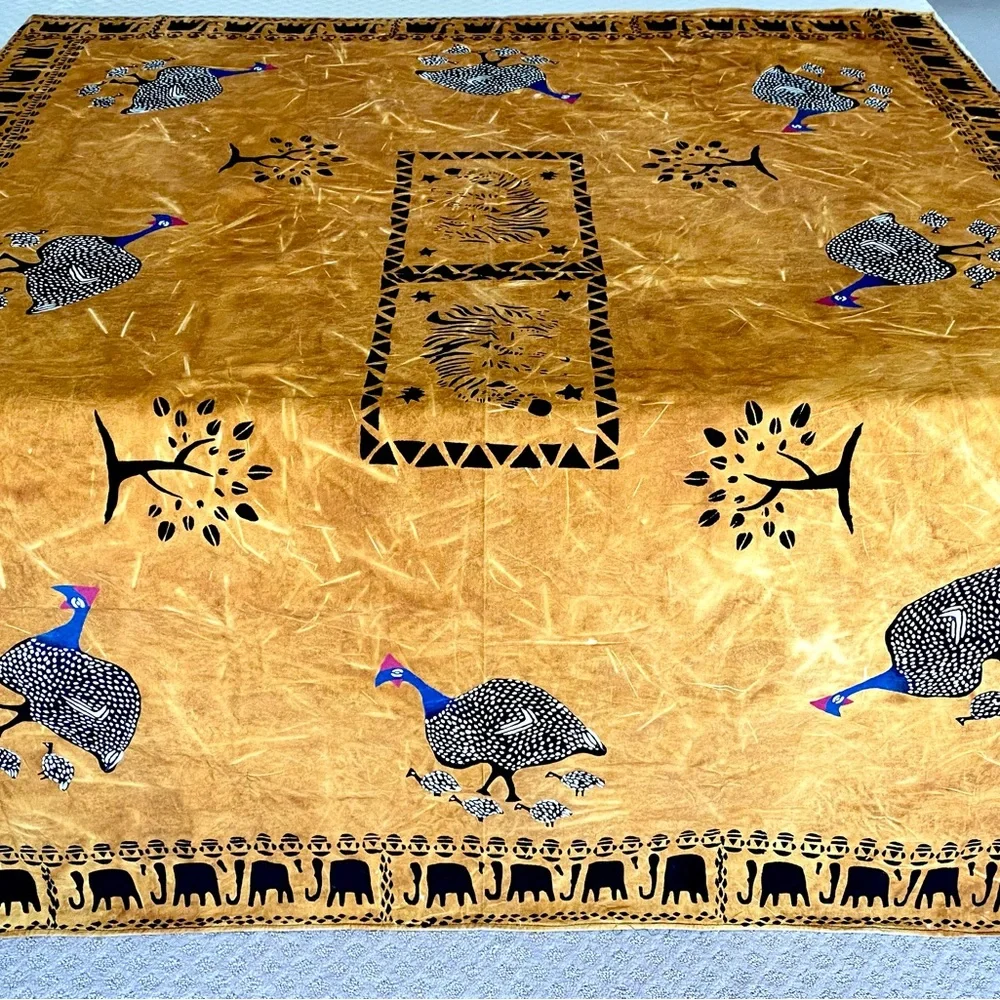 New from South Africa hand decorated table cloth with bird and elephant design.